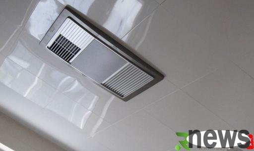 How should air-heated bathroom heaters be maintained and cleaned?