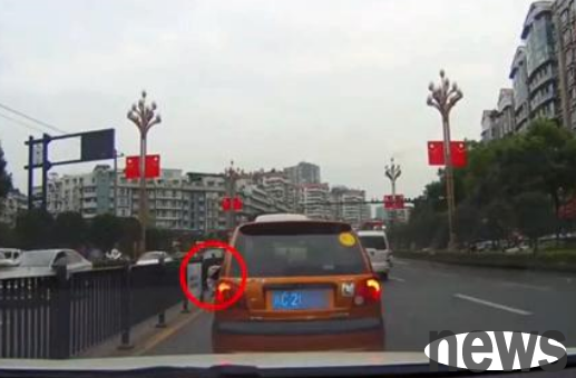 The cat was thrown out of the window by the owner and thrown on the road where the car was coming and going. The reason for the cat was thrown out is outrageous!